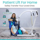 Left Side View Of The Vive Health Hydraulic Patient Lift With Sling Shown With A Woman Sitting In The Sling With The Assistance Of Another Woman With Text 'Patient Lift For Home' And 'Safely Transfer Your Loved Ones'