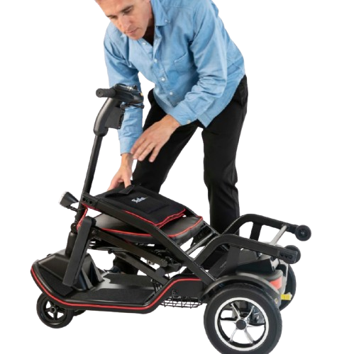 Man Folding The Feather Mobility Scooter