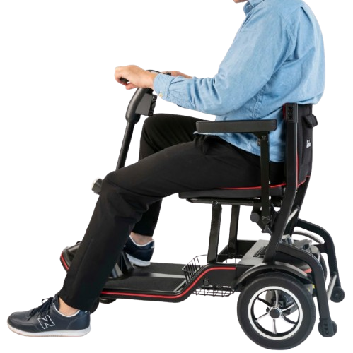 Man Sitting Using The Feather Mobility Scooter