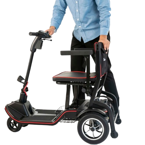 Man Standing Over Feather Mobility Scooter