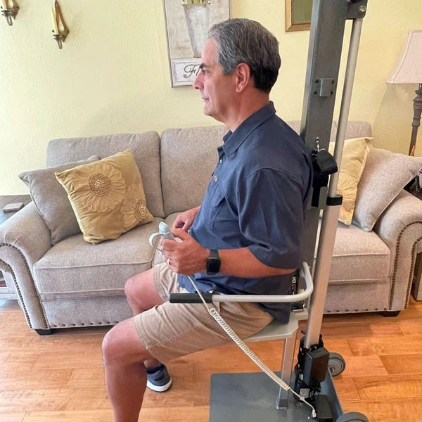 Middle Aged Man Using The IndeeLift PPU_PPU-S People Picker Upper In A Home Setting