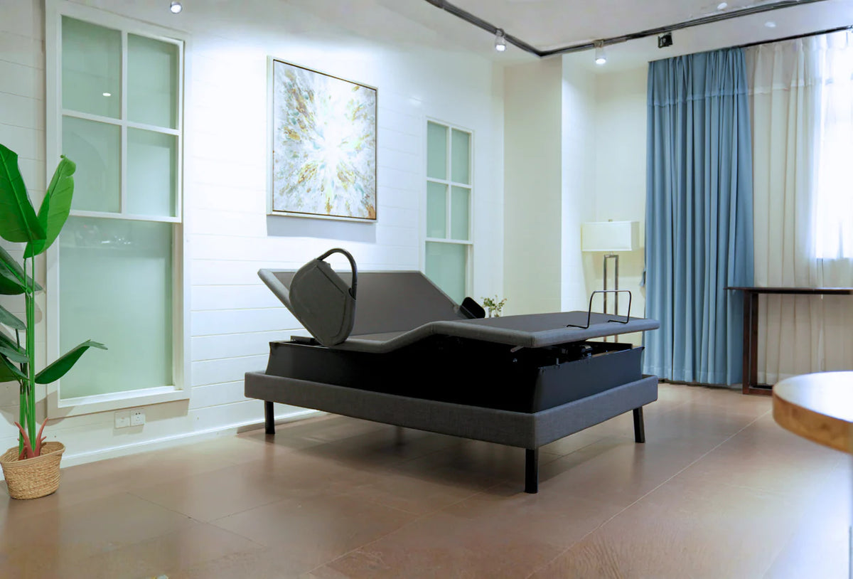 Modern Bedroom With The Ascend Hi Low Adjustable Bed with Tilt, Desk, And Decorative Elements