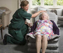 Nurse Operating The Winncare Mangar Camel With Airflo 24 For An Elderly Woman In A Home Setting