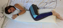 Overhead View Of A Woman In Fitness Clothing Hugging The Standard Body Pillow Eurolux Green Planet Pillow On A Mattress