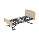 Overhead View Of The Accora Empresa 12-Function Hi-Low Adjusting Nursing Bed Shown In Arc Design And Oak Wood Finish
