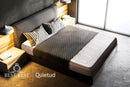 Overhead View Of The Eurolux Quietud: The 9-Layer Luxury Mattress Crafted By Masters Shown On A Minimalist Bed Frame In A Bedroom Setting