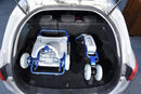 Overhead View Of The Tzora Feather Ultra-Lightweight Mobility Scooter Shown In The Blue Color Inside The Trunk Of A Compact Car