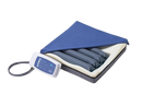 Overhead View Of The Wellell Sedens 500 Seat Cushion With Battery Power Shown With Control Unit And Part Of The Cover Removed