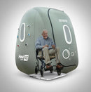 OxyRevo Heal40 Soft Hyperbaric Chamber Front View Closed Door With Elderly Man Sitting On A Wheelchair