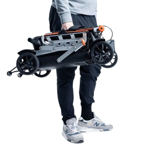 Person Holding The Feather 27X Mobility Scooter