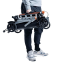 Person Holding The Feather 27X Mobility Scooter