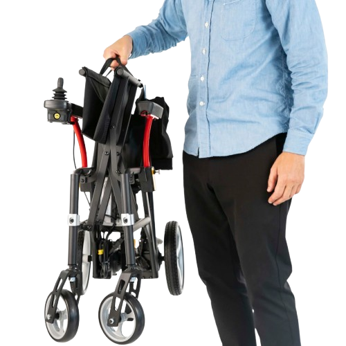 Person Holding The Feather Electric Wheelchair In The Folded Position