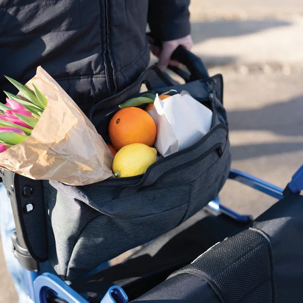 Person Pushing The Strongback Mobility SEATA Rollator With Groceries Including Fruits And Flowers 