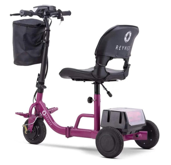 Rear Left Side View Of The Reyhee Triad Compact Folding Electric Mobility Scooter Shown With The Violet Colored Frame