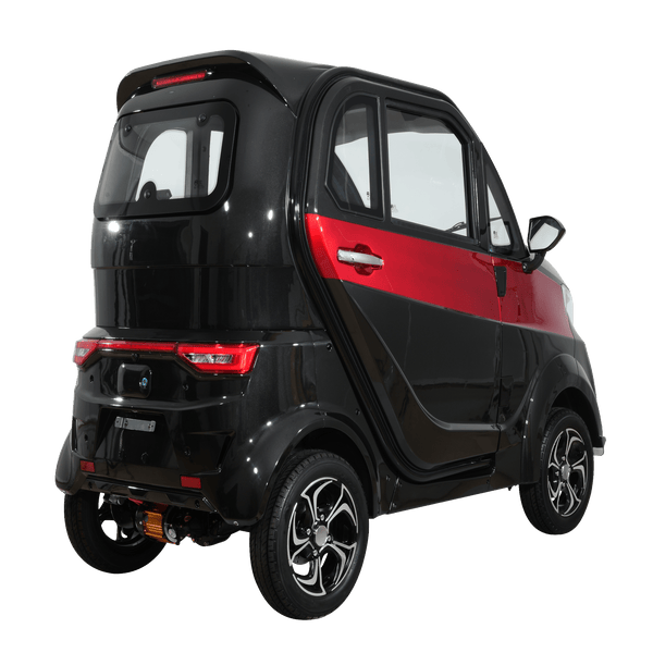 Rear Right Side View Of The Green Transporter Q Runner Express Enclosed Mobility Scooter Shown In Black And Red Color