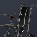 Rear View Of The Paiseec Q5 Carbon Fiber Electric Wheelchair With Armrests And Backrest On A Dark Background