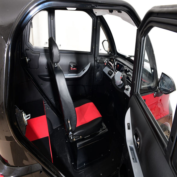 Right Side View Of The Green Transporter Q Express Enclosed Mobility Scooter Interior Shown In Red And Black Color