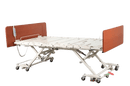 Right Side View Of The Emerald Infinity Max UltraWide Expandable Homecare Bed Shown In The Height Adjusted Position