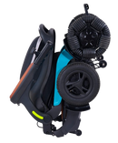 Right Side View Of The Golden Technologies Ally Pro Omnidirectional Electric Wheelchair Shown In Teal Color And In The Folded Upright Position