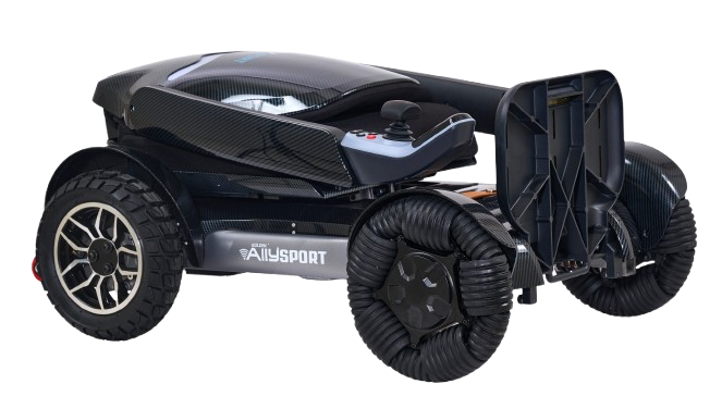 Right Side View Of The Golden Technologies Ally Sport Omnidirectional Electric Wheelchair Shown In Carbon Fiber Color In The Folded Position