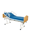 Right Side View Of The Joerns WeCare Hi-Low Adjustable Homecare Bed Shown With Mattress And Quartered Oak Headboard And Footboard In The Raised Position