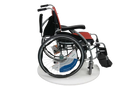 Right Side View Of The Karman S-Ergo 125 Wheelchair Shown With Red Cushions And Silver Frame