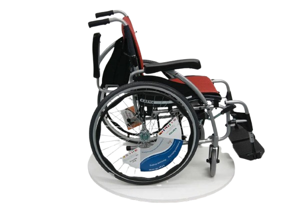 Right Side View Of The Karman S-Ergo 125 Wheelchair Shown With Red Cushions And Silver Frame