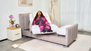 Right Side View Of The Starsleep Orin Rotating Bed Shown In The Rotating Position With A Woman Sitting In The Chair