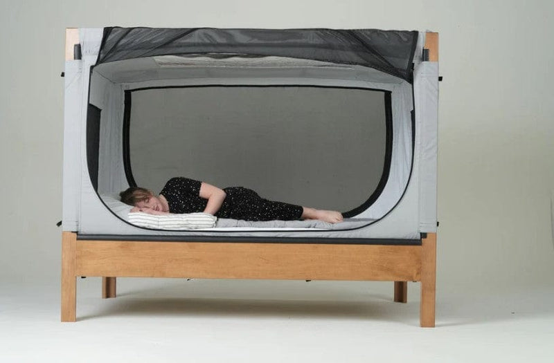 Safe Place Bedding Model 200 Brown Finish With Gray Colored Cover Side View Woman Laying Down