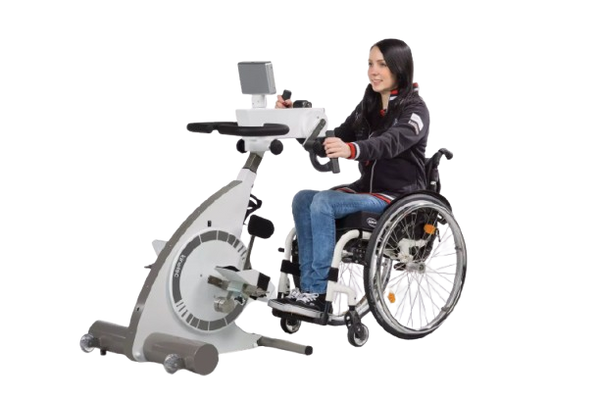 Side View Of A Woman In A Wheelchair Using The Kinetec Kinevia Duo Active Passive Trainer 