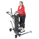 Side View Of A Woman Using The EasyStand StrapStand Standing Frame 