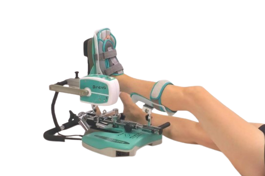 Side View Of A Woman Using The Kinetec Breva Ankle CPM Machine