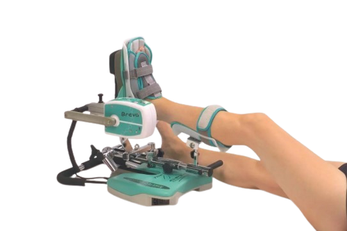 Side View Of A Woman Using The Kinetec Breva Ankle CPM Machine