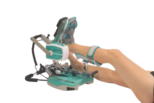 Side View Of A Woman Using The Kinetec Breva Ankle CPM Machine