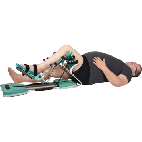 Side View Of Person Operating The Kinetec Spectra XL Knee CPM Machine