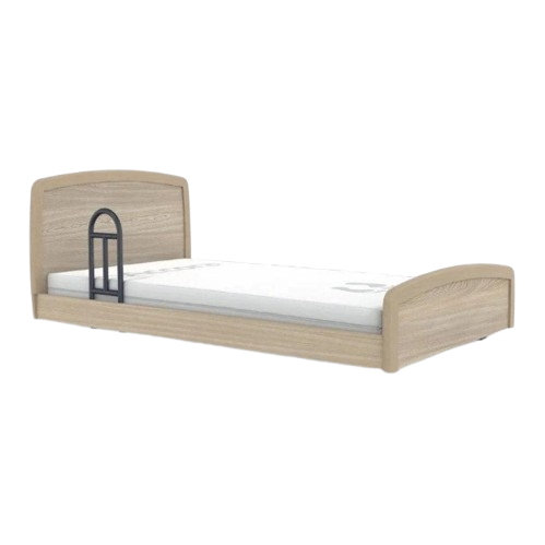 Side View Of The Accora Empresa 12-Function Hi-Low Adjusting Nursing Bed Shown In Skandi Design With One Assist Rail And Oak Wood Finish