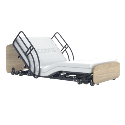 Side View Of The Accora Empresa 12-Function Hi-Low Adjusting Nursing Bed Shown In Arc Design With Two Long Half Rails And Oak Wood Finish
