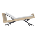 Side View Of The Accora Empresa 12-Function Hi-Low Adjusting Nursing Bed Shown In Skandi Design In The Elevated Position And Oak Wood Finish