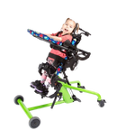 Side View Of The EasyStand Bantam Extra Small Standing Frame Shown In Green Color With Child Using The Device In Supine Position