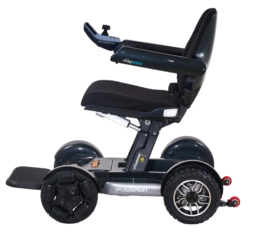 Side View Of The Golden Technologies Ally Sport Omnidirectional Electric Wheelchair Left Side Shown In Carbon Fiber Color