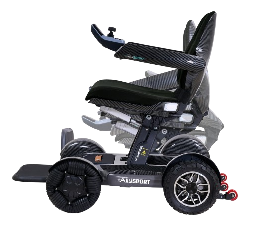 Side View Of The Golden Technologies Ally Sport Omnidirectional Electric Wheelchair Shown In Carbon Fiber Color Demonstrating Its Folding Capability