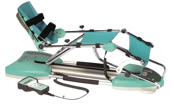 Side View Of The Kinetec Spectra Knee CPM Machine With The Remote Control