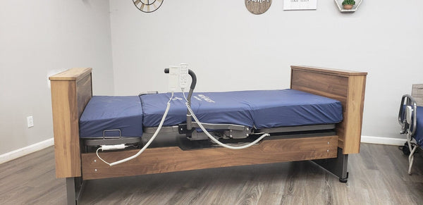 Side View Of The Med Mizer Active Care Deluxe Rotating Bed And Bed In A Home Setting
