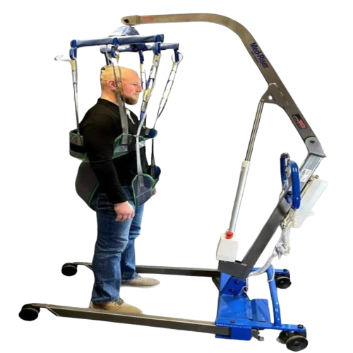 Side View Of The Med Mizer MedRiser Patient Lift With Man Operating The Lift In A Sling