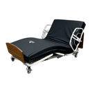 Side View Of The Med Mizer RetractaBed Adjustable Bed Shown With 2 Position 1/4 Length Side Rail Set, Mattress, And Mahogany Boards