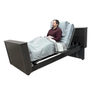 Side View Of The Med Mizer Select Care Adjustable Bed Shown With Man Lying Down 
