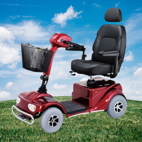 Side View Of The Merits Pioneer 4 Mobility Scooter With A Grassy Background