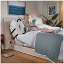 The Dawn House Bed Side View Ivory Color Elderly Woman Reading With Side Rail Mattress And Headboard