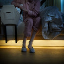 The Dawn House Bed Side View Of Elderly Woman Using Side Rail With Underbed Lighting