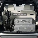 Trunk Of A Vehicle With Suitcases And The Paiseec Q5 Carbon Fiber Electric Wheelchair, Labeled 'Packed Small and Light'.